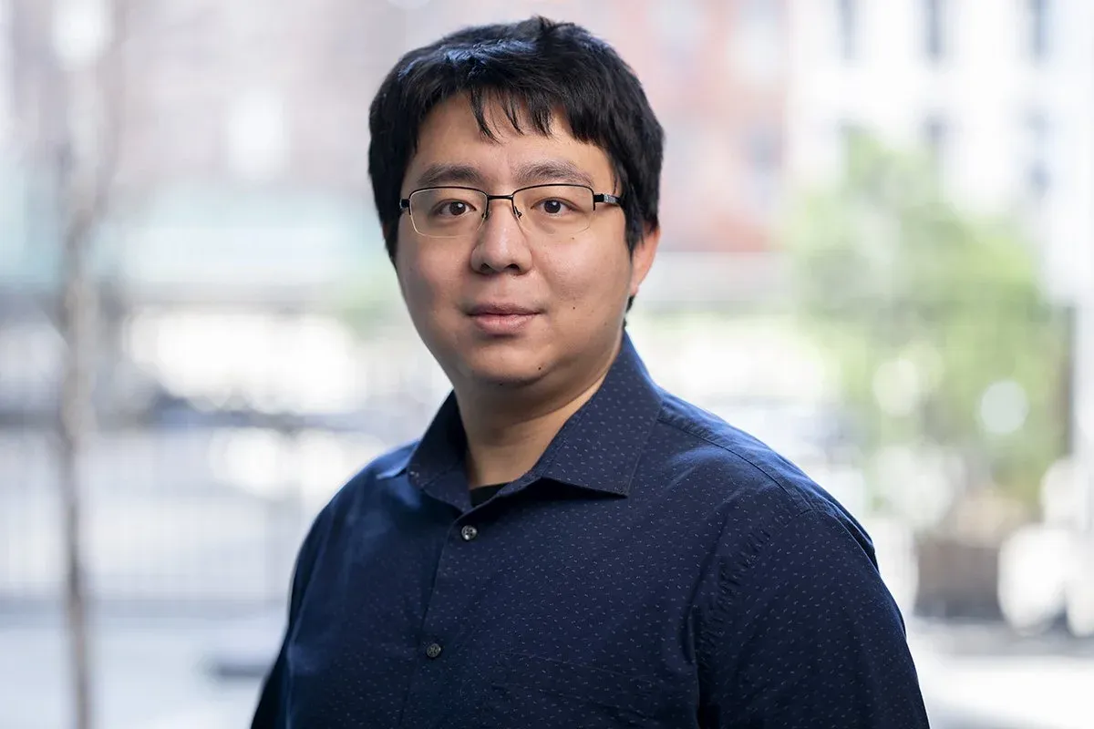 Xinjun Wang
